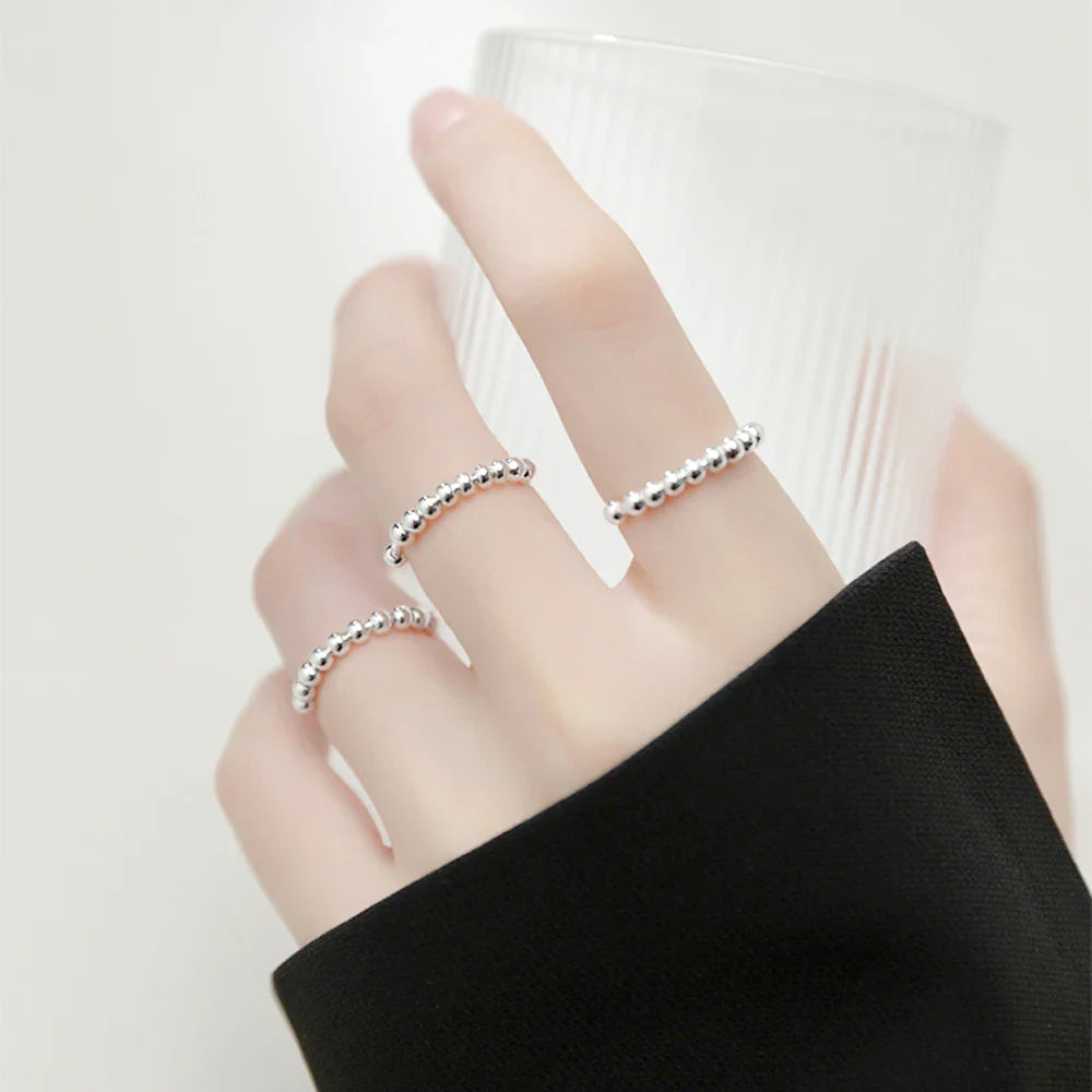 Pierścionek obrączka anty-stresowa z obracającymi się perełkami dla mężczyzn lub kobiet srebrny