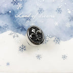 Srebrny sygnet z kwiatem lilii