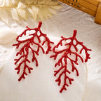 Kolczyki z gałązką czerwonego korala