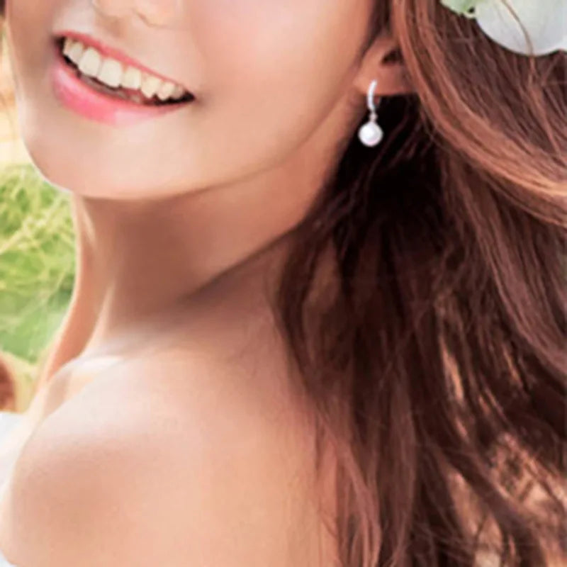 Klasyczne kolczyki z perłą i cyrkonią