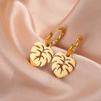 Kolczyki koła z liściem palmy