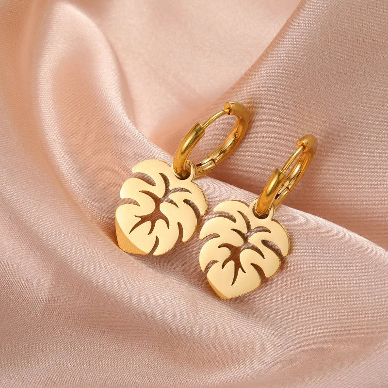 Kolczyki koła z liściem palmy