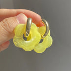 Kolczyki koła z kwiatem z żywicy