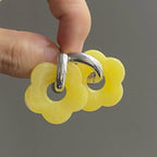 Kolczyki koła z kwiatem z żywicy