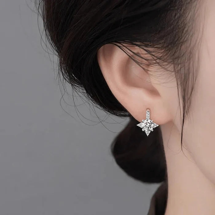 Boucles d’oreilles Étreinte d’Étoiles Filantes Moissanite