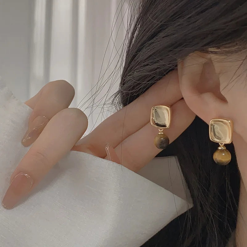 Kolczyki damskie z kamieniem oko tygrysa