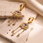 Długie niebieskie kolczyki z motywem złego oka