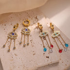 Długie niebieskie kolczyki z motywem złego oka