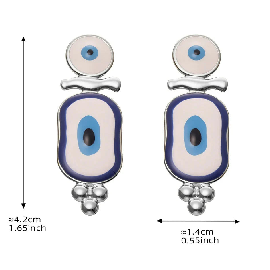 Etniczne wiszące kolczyki z niebieskim okiem