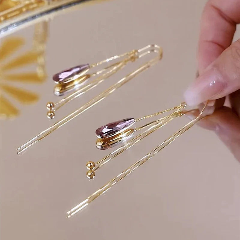 Kolczyki wiszące kropla wody z fioletowym cyrkoniem