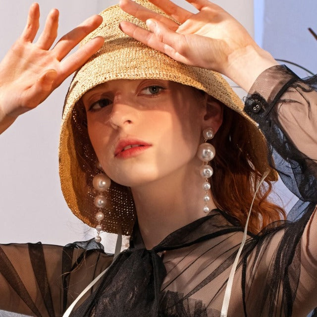 Kolczyki wiszące z perłami