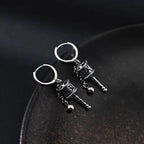 Kolczyki wiszące z buddyjskim kołem modlitewnym