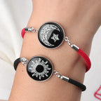 Bransoletka z półksiężycem i jasnym czerwono-czarnym słońcem