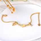 Bransoletka ochronna z ręką Fatimy i niebieskim okiem złota