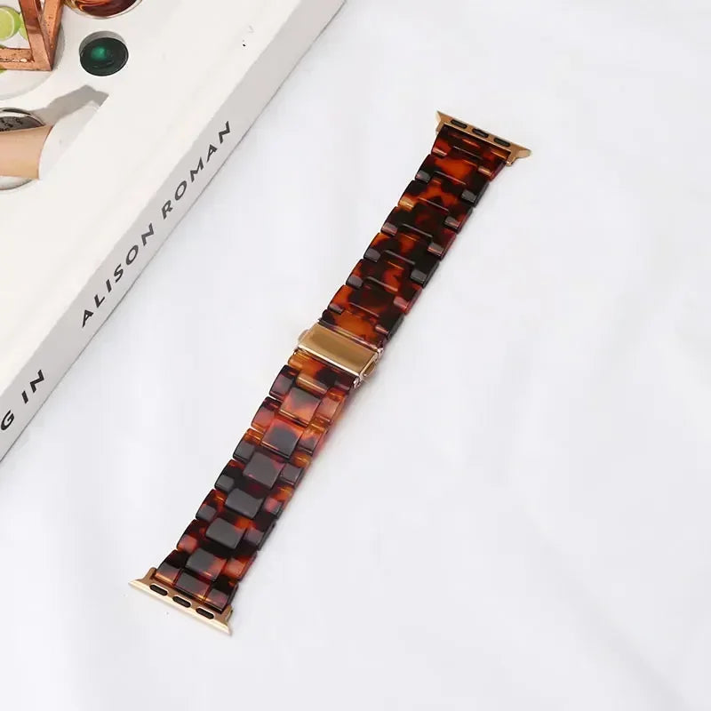Wymienny pasek z żywicy do Apple Watch w kolorze brązowo-złotym