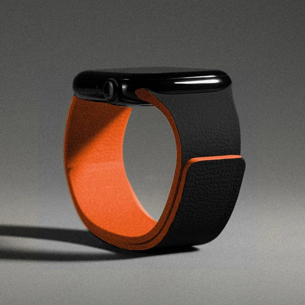 Wymienny magnetyczny pasek silikonowy do Apple Watch w kolorze czarno-pomarańczowym