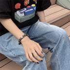 Bransoletka w stylu vintage z czarnymi gwiazdkami