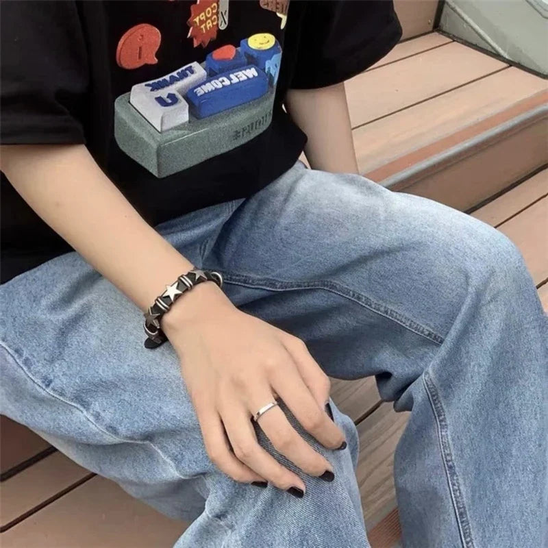 Bransoletka w stylu vintage z czarnymi gwiazdkami