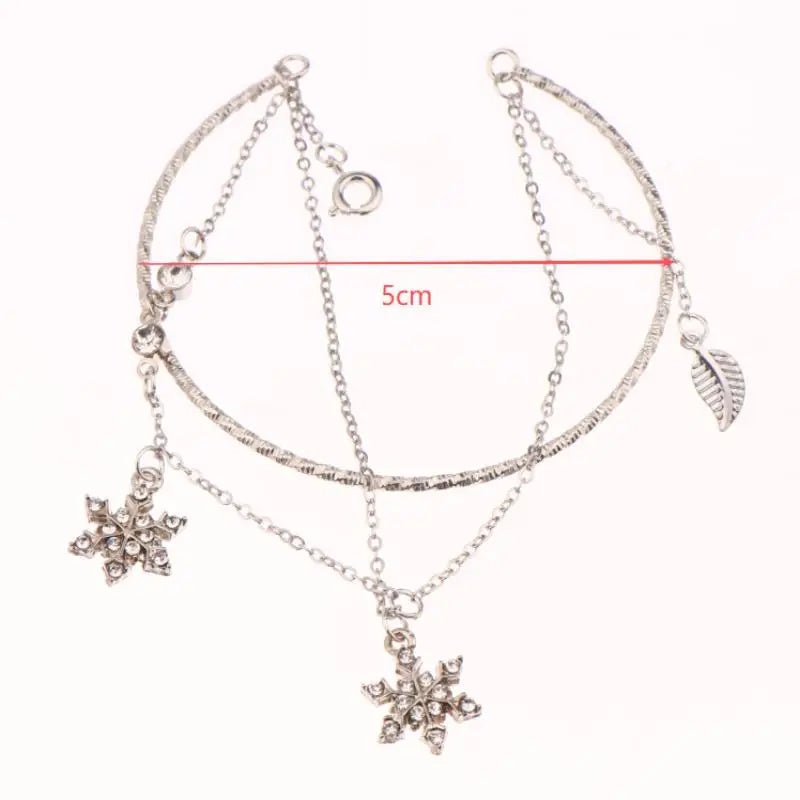 Podwójna bransoletka z kryształowymi płatkami śniegu