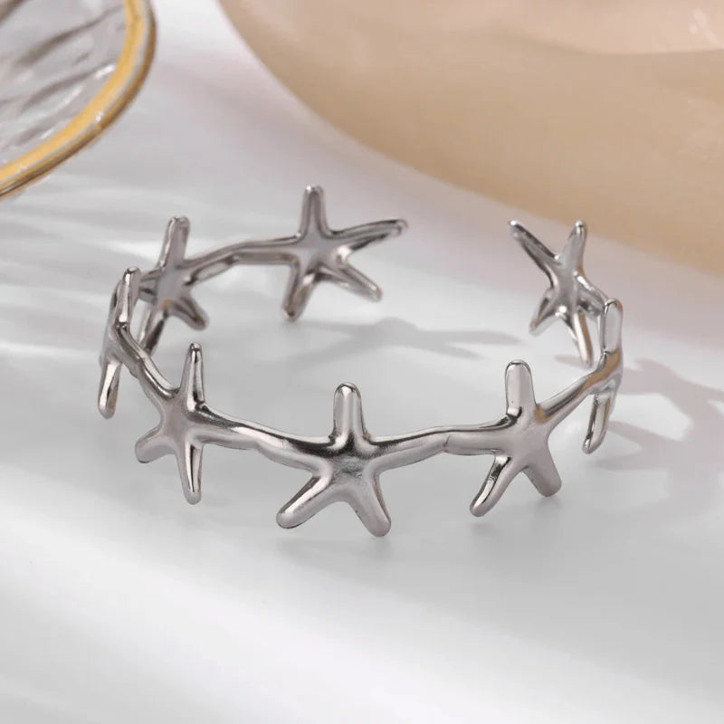 Bracelet Elégant Coquillages Etoile de Mer et Coquilles Saint-Jacques étoile de mer argent