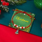 Bransoletka z liny z czerwonym wisiorkiem świątecznym choinki