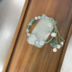 Bransoletka z liny z koralikami i kwiatem lotosu