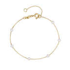 Końcówka bransoletki typu gourmette z białymi perełkami