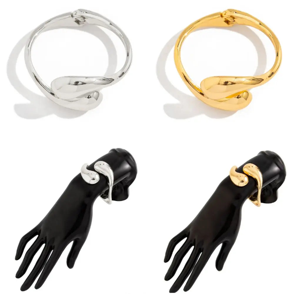 Bransoletka Gourmette z dużymi asymetrycznymi kroplami wody złota