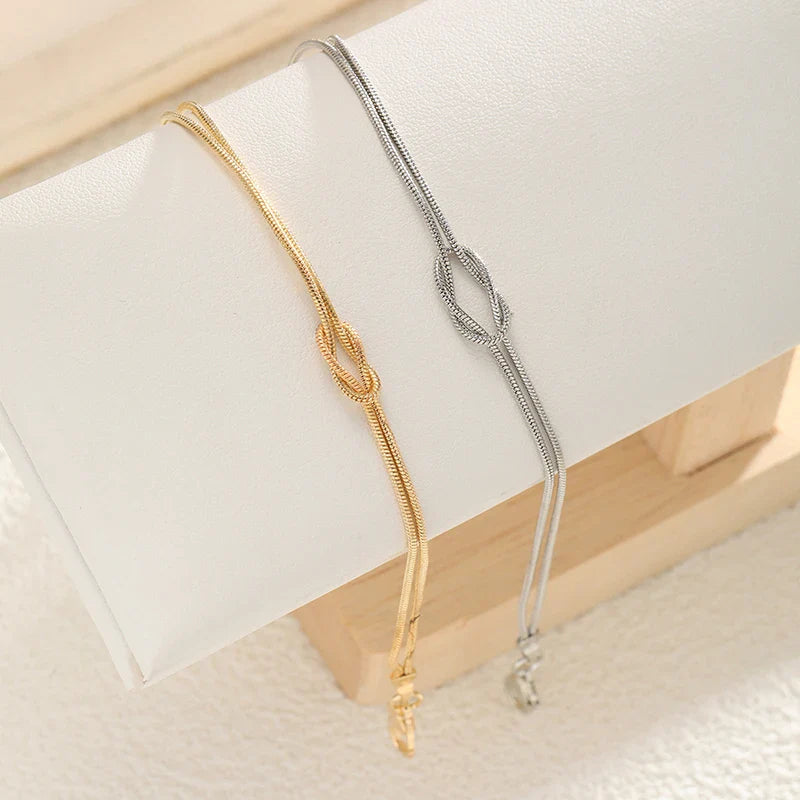 Bransoletka dla pary z węzłem splecionym w złocie i srebrze (Zestaw 2 bransoletek)