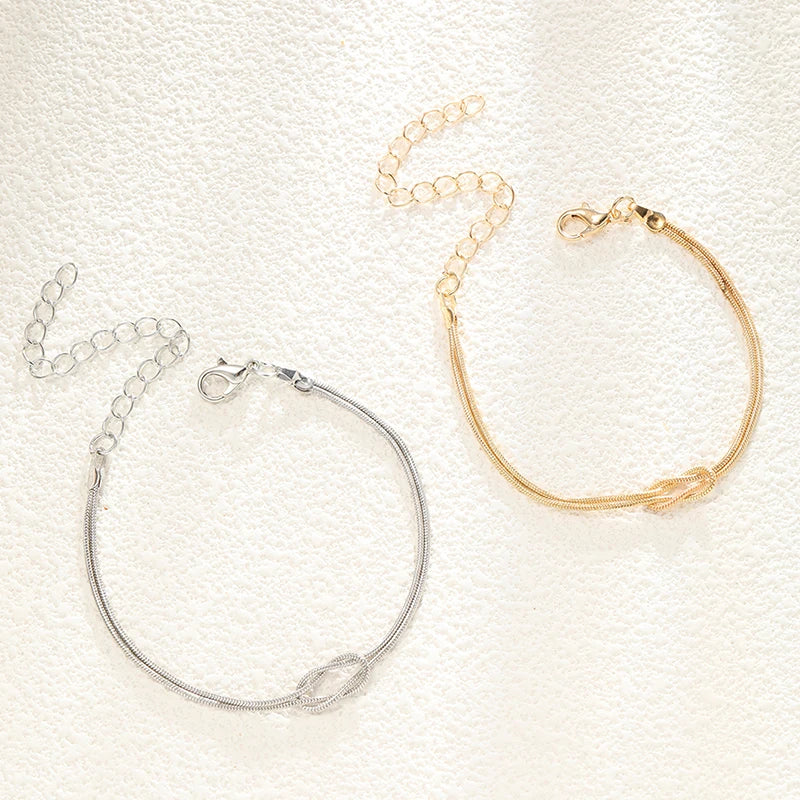 Bransoletka dla pary z węzłem splecionym w złocie i srebrze (Zestaw 2 bransoletek)