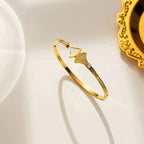 Etniczna bransoletka muszelka muszla Świętego Jakuba złota