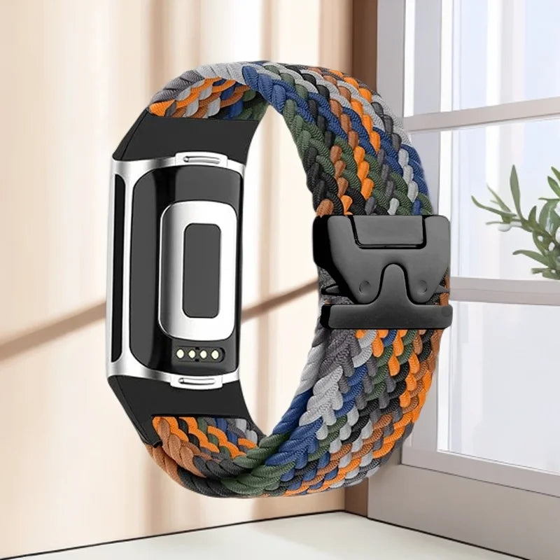 Pleciony pasek do zegarka Fitbit Charge 5, Charge 6 pomarańczowo-niebiesko-zielony