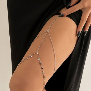 Lårkjede med gull- og sølvstjerner i sølv