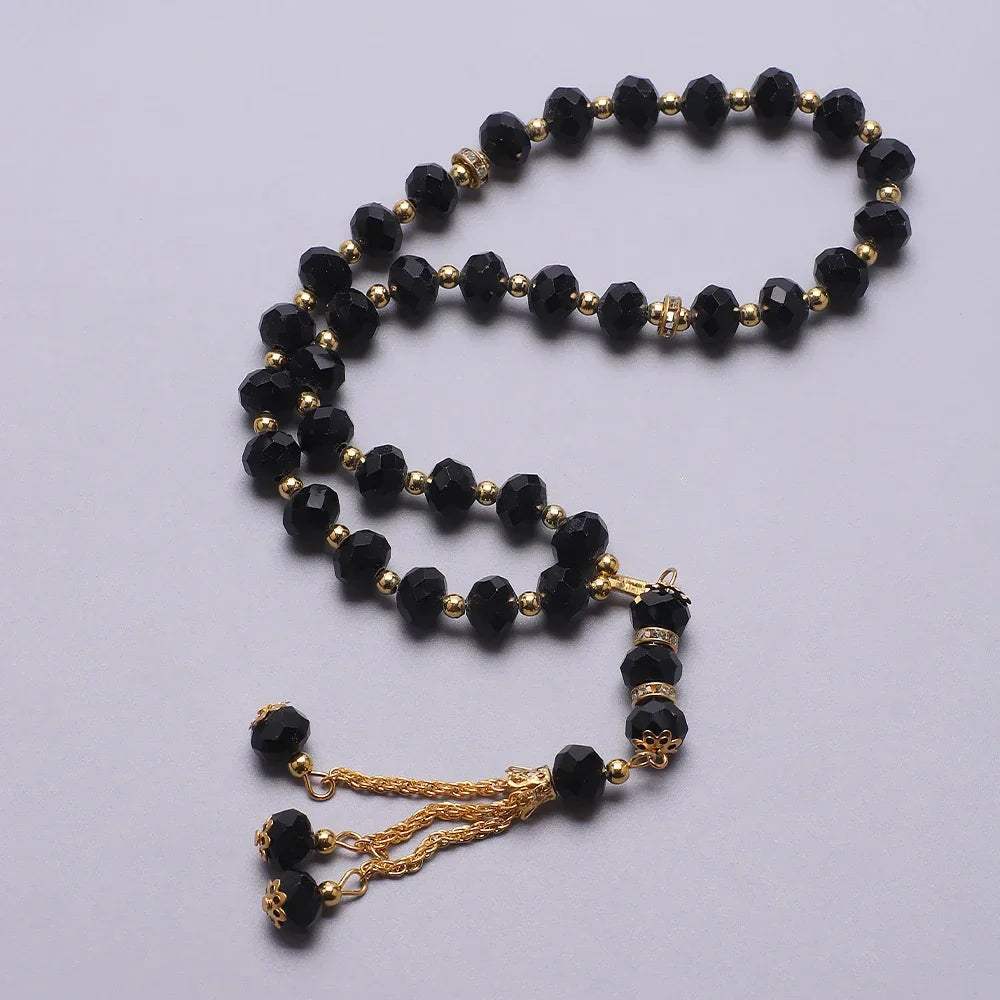 Elegancki muzułmański różaniec - islamski tasbih 33 czarne i złote koraliki