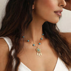 Naszyjnik z zawieszką łapacza snów i turkusowymi koralikami