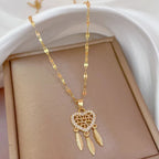 Naszyjnik z zawieszką w kształcie serca z kryształem łapacza snów