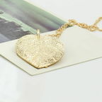 Halskjede med høstløv anheng