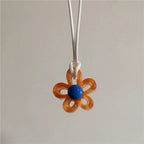 Naszyjnik z brązowym kolorowym kwiatowym wisiorkiem