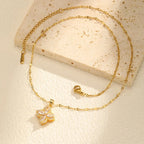 Naszyjnik z obrotowym wisiorkiem w kształcie kwiatu z cyrkoniami, przeciwstresowy