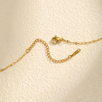 Naszyjnik z obrotowym wisiorkiem w kształcie kwiatu z cyrkoniami, przeciwstresowy