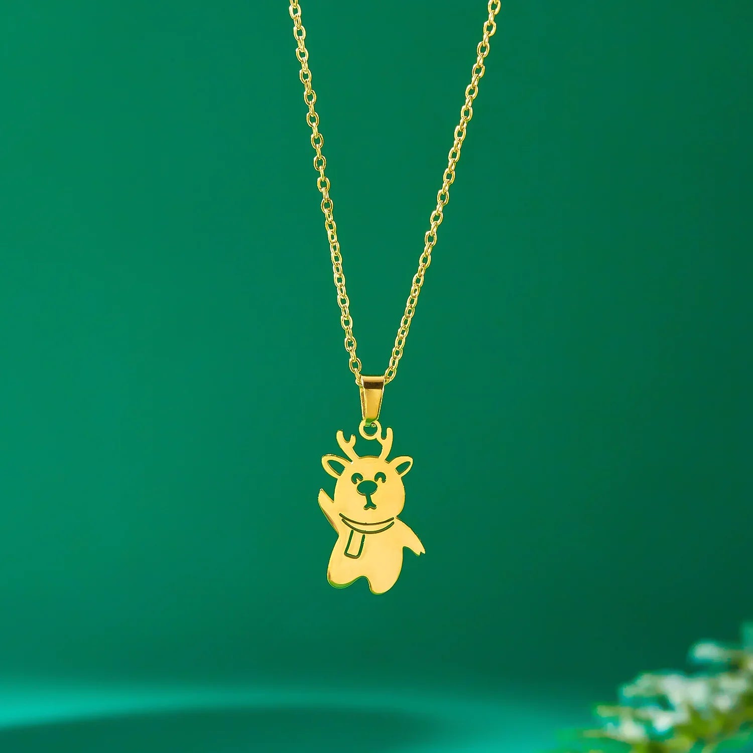 Halskæde med vintervedhæng snemand guld