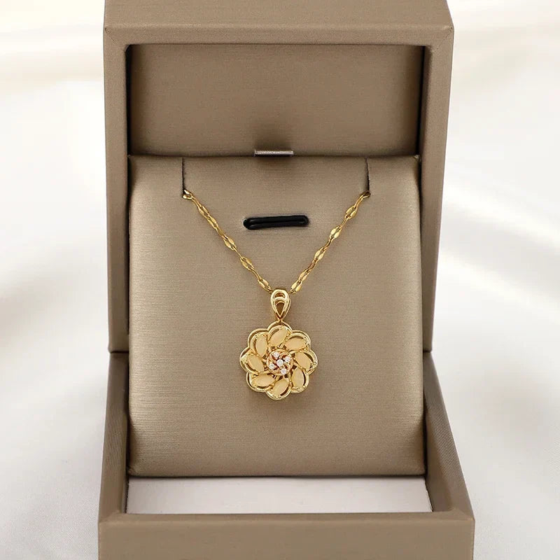 Halskæde med roterende anti-stress blomst vedhæng