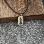 Halskæde med juletræsvedhæng i guld