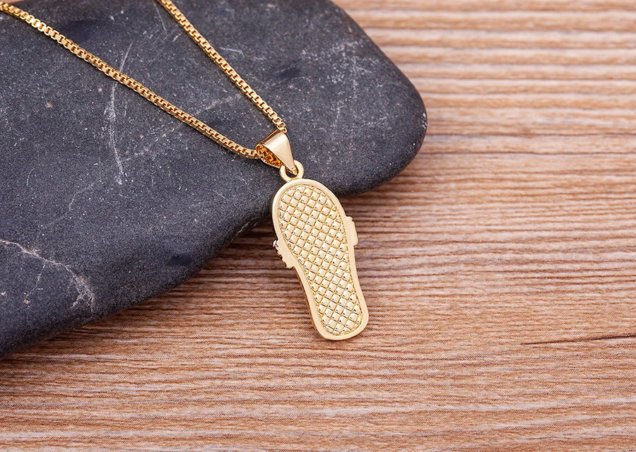 Halskæde med vedhæng tounge blå øje og zirkon