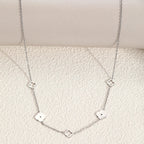 Halskæde med vedhæng med 4-bladet kløver i sølv