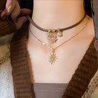 Podwójny naszyjnik z wisiorkiem słońca