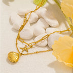 Naszyjnik z podwójnym rzędami zawieszek muszli muszla św. Jakuba i rozgwiazda