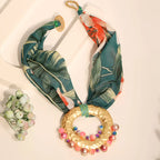 Naszyjnik z tkaniny z boho-chic zielonym wisiorkiem