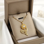 Naszyjnik z zawieszką z sercem i obracającym się słonecznikiem przeciwstresowym