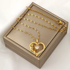 Naszyjnik z zawieszką z obracającym się sercem i kwiatem, przeciwstresowy